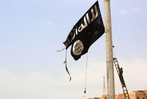 Bandiera dell'Isis, Photocredit DELIL SOULEIMAN  Courtesy AFP